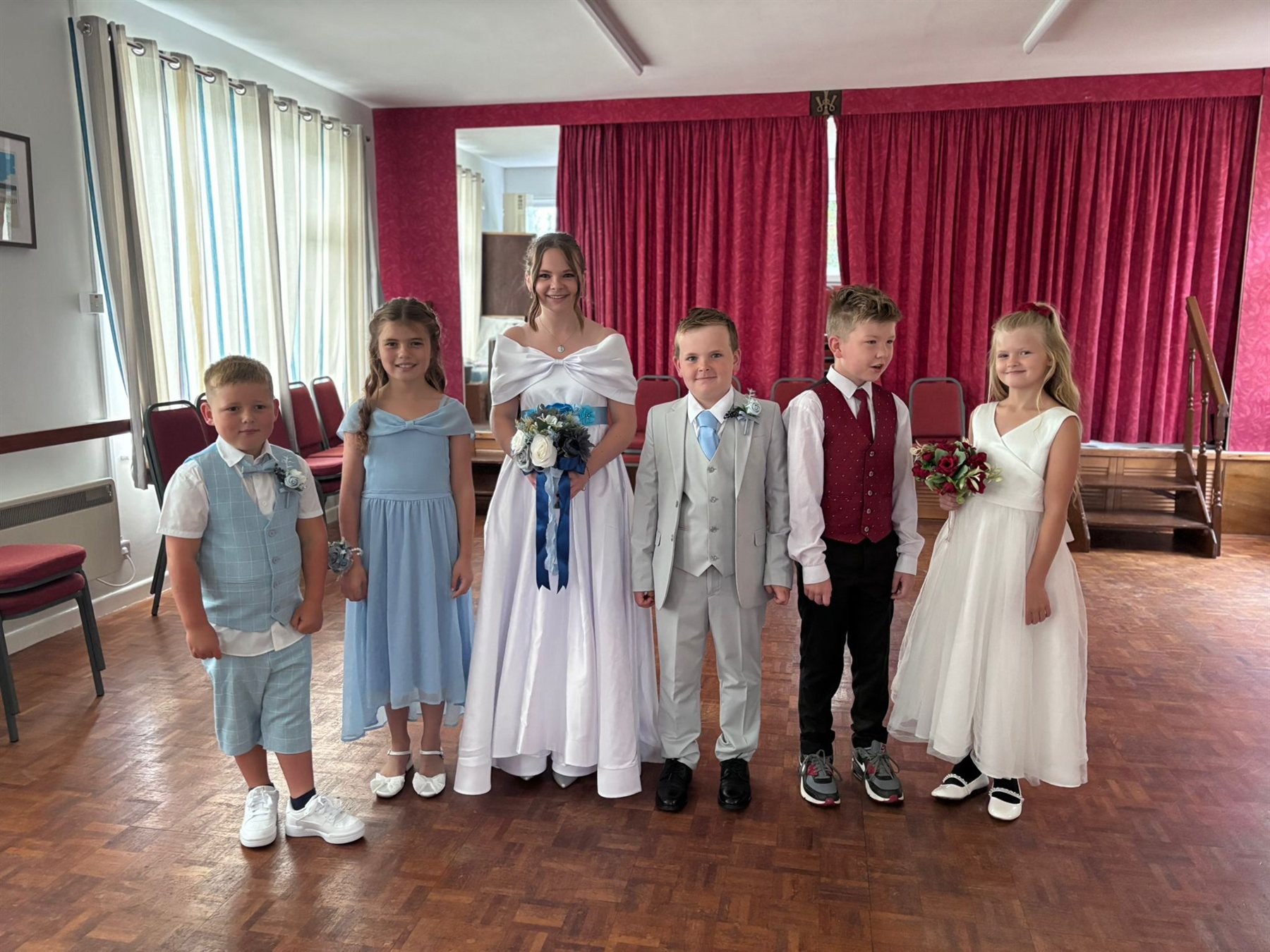 Six members of the 2026 Polruan Regatta Royalty in their ceremonial dress