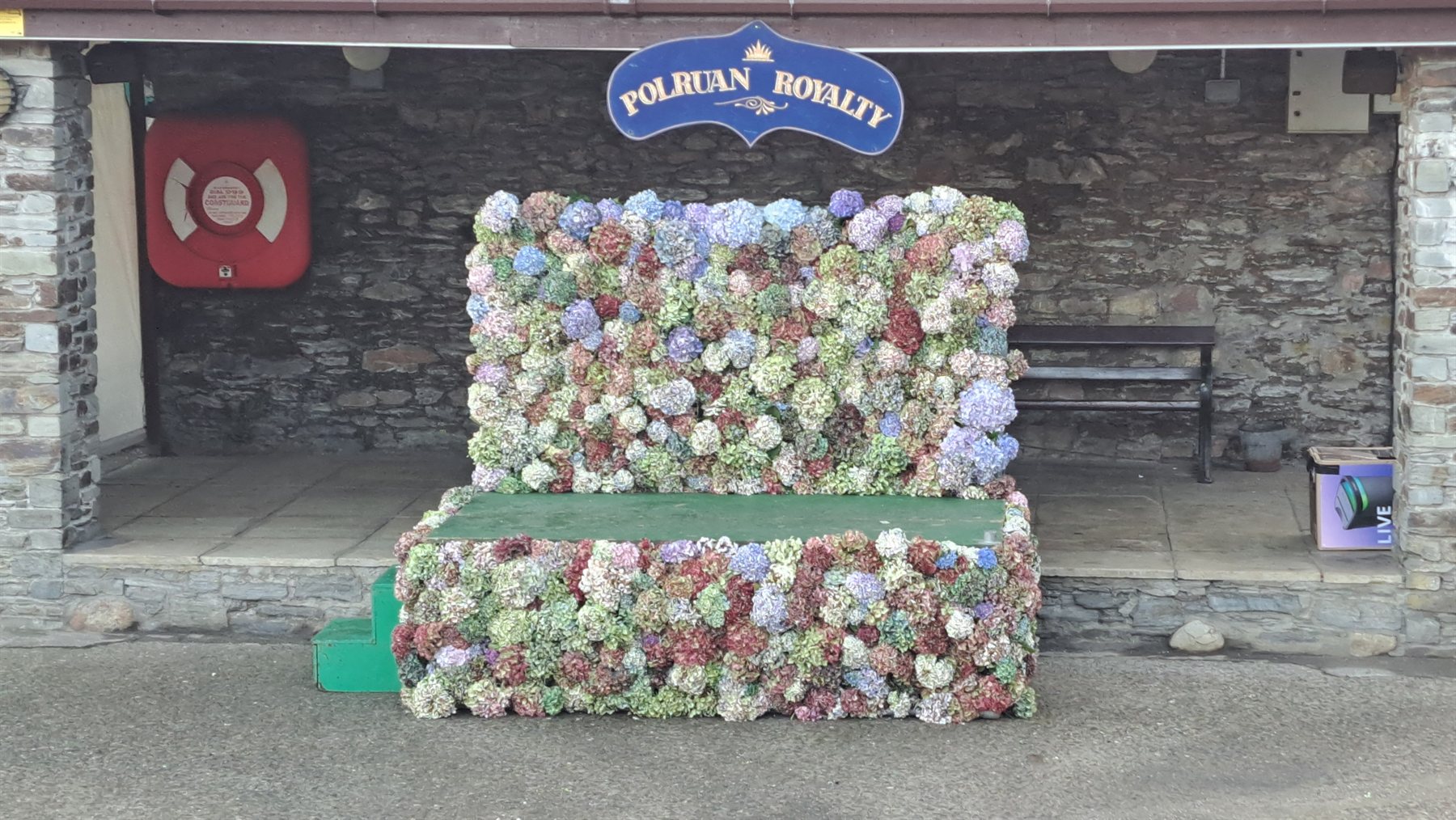 Hydrangea-decorated Polruan Royalty stage ready for the 2026 Regatta